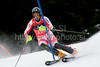 Reinfried Herbst (AUT) attacks a control gate while competing in the mens Hahnenkamm slalom race part of the  70th Hahnenkamm Rennen race weekend, which is a fixture on the 2009/10 Audi FIS Alpine Skiing World Cup. Slalom race of men Audi FIS Alpine skiing World cup was held in Kitzbuhel, Austria, on 24th of January 2010.
