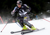 Jimmy Cochran (USA) attacks a control gate while competing in the mens Hahnenkamm slalom race part of the  70th Hahnenkamm Rennen race weekend, which is a fixture on the 2009/10 Audi FIS Alpine Skiing World Cup. Slalom race of men Audi FIS Alpine skiing World cup was held in Kitzbuhel, Austria, on 24th of January 2010.

