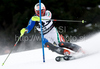 Christian Deville (ITA) attacks a control gate while competing in the mens Hahnenkamm slalom race part of the  70th Hahnenkamm Rennen race weekend, which is a fixture on the 2009/10 Audi FIS Alpine Skiing World Cup. Slalom race of men Audi FIS Alpine skiing World cup was held in Kitzbuhel, Austria, on 24th of January 2010.
