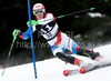 Carlo Janka (SUI) attacks a control gate while competing in the mens Hahnenkamm slalom race part of the  70th Hahnenkamm Rennen race weekend, which is a fixture on the 2009/10 Audi FIS Alpine Skiing World Cup. Slalom race of men Audi FIS Alpine skiing World cup was held in Kitzbuhel, Austria, on 24th of January 2010.
