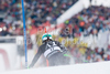 Ted Ligety (USA) attacks a control gate while competing in the mens Hahnenkamm slalom race part of the  70th Hahnenkamm Rennen race weekend, which is a fixture on the 2009/10 Audi FIS Alpine Skiing World Cup. Slalom race of men Audi FIS Alpine skiing World cup was held in Kitzbuhel, Austria, on 24th of January 2010.
