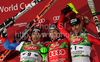 Winner Reinfried Herbst of Austria (M), second placed Silvan Zurbriggen of Switzerland (L) and third placed Manfred Pranger of Austria celebrate their medals won in Men Night slalom race of Audi FIS alpine skiing World Cup in Schladming, Austria. Slalom race of Men Audi FIS Alpine skiing World Cup 2009-10 was held in Schladming, Austria, on 26th of January 2010.
