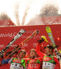 Winner Reinfried Herbst of Austria (M), second placed Silvan Zurbriggen of Switzerland (L) and third placed Manfred Pranger of Austria celebrate their medals won in Men Night slalom race of Audi FIS alpine skiing World Cup in Schladming, Austria. Slalom race of Men Audi FIS Alpine skiing World Cup 2009-10 was held in Schladming, Austria, on 26th of January 2010.
