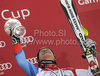 Winner Didier Cuche of Switzerland celebrates overall Downhill World cup victory after last Men downhill race of Audi FIS alpine skiing World Cup, which was held on Kandahar downhill course in Garmisch-Partenkirchen, Germany. Last downhill race of Men Audi FIS Alpine skiing World Cup 2009-10, was held on Wednesday, 10th of March 2010 in Garmisch-Partenkirchen, Germany.
