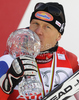 Winner Didier Cuche of Switzerland celebrates overall Downhill World cup victory after last Men downhill race of Audi FIS alpine skiing World Cup, which was held on Kandahar downhill course in Garmisch-Partenkirchen, Germany. Last downhill race of Men Audi FIS Alpine skiing World Cup 2009-10, was held on Wednesday, 10th of March 2010 in Garmisch-Partenkirchen, Germany.
