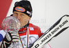 Winner Didier Cuche of Switzerland celebrates overall Downhill World cup victory after last Men downhill race of Audi FIS alpine skiing World Cup, which was held on Kandahar downhill course in Garmisch-Partenkirchen, Germany. Last downhill race of Men Audi FIS Alpine skiing World Cup 2009-10, was held on Wednesday, 10th of March 2010 in Garmisch-Partenkirchen, Germany.
