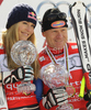Downhill World cup winners Lindsey Vonn of USA (L) and Didier Cuche of Switzerland (R) celebrate overall Downhill World cup victory after last downhill races of Audi FIS alpine skiing World Cup, which were held on Kandahar downhill course in Garmisch-Partenkirchen, Germany. Last downhill races of Audi FIS Alpine skiing World Cup 2009-10, were held on Wednesday, 10th of March 2010 in Garmisch-Partenkirchen, Germany.
