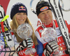 Downhill World cup winners Lindsey Vonn of USA (L) and Didier Cuche of Switzerland (R) celebrate overall Downhill World cup victory after last downhill races of Audi FIS alpine skiing World Cup, which were held on Kandahar downhill course in Garmisch-Partenkirchen, Germany. Last downhill races of Audi FIS Alpine skiing World Cup 2009-10, were held on Wednesday, 10th of March 2010 in Garmisch-Partenkirchen, Germany.
