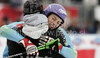 Winner Tina Maze of Slovenia (R) gets congratulations from her coach Andrea Massi (L) in finish of second run of last Women Giant slalom race of Audi FIS alpine skiing World Cup, which was held on Kandahar course in Garmisch-Partenkirchen, Germany. Last Giant slalom race of Women Audi FIS Alpine skiing World Cup 2009-10, was held on Thursday, 11th of March 2010 in Garmisch-Partenkirchen, Germany.
