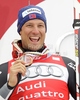 Third placed Aksel Lund Svindal of Norway celebrates overall Super-G World cup medal after last Men Super-G race of Audi FIS alpine skiing World Cup, which was held on Kandahar course in Garmisch-Partenkirchen, Germany. Last Super-G race of Men Audi FIS Alpine skiing World Cup 2009-10, was held on Thursday, 11th of March 2010 in Garmisch-Partenkirchen, Germany.

