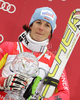 Winner Kathrin Hoelzl of Germany celebrates overall Super-G World cup victory after last Women Super-G race of Audi FIS alpine skiing World Cup, which was held on Kandahar course in Garmisch-Partenkirchen, Germany. Last Super-G race of Women Audi FIS Alpine skiing World Cup 2009-10, was held on Thursday, 11th of March 2010 in Garmisch-Partenkirchen, Germany.
