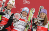 Winner Kathrin Hoelzl of Germany (M), second placed Kathrin Zettel of Austria (L) and third placed Tina Maze of Slovenia (R) celebrates overall Super-G World cup victory after last Women Super-G race of Audi FIS alpine skiing World Cup, which was held on Kandahar course in Garmisch-Partenkirchen, Germany. Last Super-G race of Women Audi FIS Alpine skiing World Cup 2009-10, was held on Thursday, 11th of March 2010 in Garmisch-Partenkirchen, Germany.
