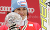 Winner Kathrin Hoelzl of Germany celebrates overall Super-G World cup victory after last Women Super-G race of Audi FIS alpine skiing World Cup, which was held on Kandahar course in Garmisch-Partenkirchen, Germany. Last Super-G race of Women Audi FIS Alpine skiing World Cup 2009-10, was held on Thursday, 11th of March 2010 in Garmisch-Partenkirchen, Germany.
