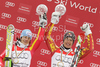 Overall super-g winner Erik Guay of Canada (R) and overall giant slalom winner Kathrin Hoelzl of Germany celebrates overall World cup victories after last Women Giant slalom and last men Super-G race of Audi FIS alpine skiing World Cup, which was held on Kandahar course in Garmisch-Partenkirchen, Germany. Last races of Women Audi FIS Alpine skiing World Cup 2009-10, were held on Thursday, 11th of March 2010 in Garmisch-Partenkirchen, Germany.
