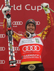 Winner Erik Guay of Canada celebrates his medal won in last Men Super-G race of Audi FIS alpine skiing World Cup, which was held on Kandahar course in Garmisch-Partenkirchen, Germany. Last Super-G race of Men Audi FIS Alpine skiing World Cup 2009-10, was held on Thursday, 11th of March 2010 in Garmisch-Partenkirchen, Germany.
