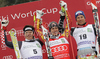 Winner Erik Guay of Canada (M), second placed Ivica Kostelic of Croatia (L) and third placed Aksel Lund Svindal of Norway (R) celebrate their medals won in last Men Super-G race of Audi FIS alpine skiing World Cup, which was held on Kandahar course in Garmisch-Partenkirchen, Germany. Last Super-G race of Men Audi FIS Alpine skiing World Cup 2009-10, was held on Thursday, 11th of March 2010 in Garmisch-Partenkirchen, Germany.

