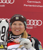 Anja Paerson of Sweden celebrates overall Audi FIS Alpine skiing World cup third place after last race of Audi FIS alpine skiing World Cup, which was held in Garmisch-Partenkirchen, Germany. Last slalom race of Audi FIS Alpine skiing World Cup 2009-10, was held on Saturday, 13th of March 2010 in Garmisch-Partenkirchen, Germany.
