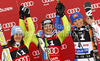 Winner Viktoria Rebensburg of Germany (M), second placed Kathrin Hoelzl of Germany (L) and third placed Manuela Moelgg of Italy (R) celebrate their medals won in Women giant slalom race of Audi FIS alpine skiing World Cup in Soelden, Austria. First giant slalom race of Women Audi FIS Alpine skiing World Cup 2010-11, was held on Saturday, 23rd of October 2010, on Rettenbach glacier above Soelden, Austria.
