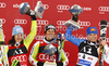 Winner Viktoria Rebensburg of Germany (M), second placed Kathrin Hoelzl of Germany (L) and third placed Manuela Moelgg of Italy (R) celebrate their medals won in Women giant slalom race of Audi FIS alpine skiing World Cup in Soelden, Austria. First giant slalom race of Women Audi FIS Alpine skiing World Cup 2010-11, was held on Saturday, 23rd of October 2010, on Rettenbach glacier above Soelden, Austria.
