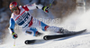 CUCHE Didier (SUI)  speeds down the course whilst competing in  the FIS alpine skiing world cup giant slalom race on the Bellevarde race piste Val dIsere.
