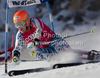 LIGETY Ted (USA)  attacks a control gate whilst competing in  the FIS alpine skiing world cup giant slalom race on the Bellevarde race piste Val dIsere.
