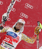 Third placed Erik Guay of Canada celebrates his medal won in Men Super-G race of Audi FIS alpine skiing World Cup in Val Gardena, Italy. Super-G race of Men Audi FIS Alpine skiing World Cup 2010-11, was held on Friday, 17th of December 2010, on Saslong course in Val Gardena, Italy.
