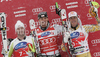 Winner Michael Walchhofer of Austria (M), second placed Stephan Keppler of Germany (L) and third placed Erik Guay of Canada (R) celebrate their medals won in Men Super-G race of Audi FIS alpine skiing World Cup in Val Gardena, Italy. Super-G race of Men Audi FIS Alpine skiing World Cup 2010-11, was held on Friday, 17th of December 2010, on Saslong course in Val Gardena, Italy.
