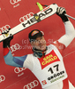 Third placed Didier Cuche of Switzerland celebrates his medal won in Men downhill race of Audi FIS alpine skiing World Cup in Val Gardena, Italy. Downhill race of Men Audi FIS Alpine skiing World Cup 2010-11, was held on Saturday, 18th of December 2010, on Saslong course in Val Gardena, Italy.
