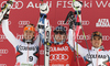 Winner Ted Ligety of USA (M), second placed Cyprien Richard of France (L) and his third placed teammate Thomas Fanara of France (R) celebrate their medals won in Men giant slalom race of Audi FIS alpine skiing World Cup in Alta Badia, Italy. Giant slalom race of Men Audi FIS Alpine skiing World Cup 2010-11, was held on Sunday, 20th of December 2010, on Gran Risa course in Alta Badia, Italy.
