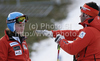Tanja Poutiainen of Finland (L) with her coach Luca Moretti (R) during inspection of first run of Women giant slalom race of Audi FIS alpine skiing World Cup in Maribor, Slovenia. Giant slalom race of Women Audi FIS Alpine skiing World Cup 2010-11, was held on Saturday, 15th of January 2011, in Maribor, Slovenia.
