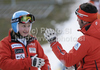 Tanja Poutiainen of Finland (L) with her coach Luca Moretti (R) during inspection of first run of Women giant slalom race of Audi FIS alpine skiing World Cup in Maribor, Slovenia. Giant slalom race of Women Audi FIS Alpine skiing World Cup 2010-11, was held on Saturday, 15th of January 2011, in Maribor, Slovenia.
