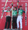 Georg Streitberger (AUT) (L) 2nd place Ivica Kostelic (CRO) (C) Winner and Aksel Lund Svindal (NOR) (R) 3rd  during the flower ceremony for the 2011 Hahnenkamm Super Giant Slalom race (Super G)part of  Audi FIS World Cup races in Kitzbuhel Austria.
