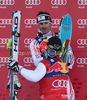 Didier Cuche (SUI) winner congratulates Adrien Theaux (FRA) 2nd at the presentation ceremony for the 71st Hahnenkamm downhill race part of  Audi FIS World Cup races in Kitzbuhel Austria.
