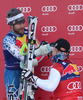 Bode Miller (USA) 2nd congratulates Didier Cuche (SUI) winner at the presentation ceremony for the 71st Hahnenkamm downhill race part of  Audi FIS World Cup races in Kitzbuhel Austria.
