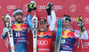 Bode Miller (USA) (L) 2nd Didier Cuche (SUI) (C) Winner and Adrien Theaux (FRA) 3rd at the presentation ceremony for the 71st Hahnenkamm downhill race part of  Audi FIS World Cup races in Kitzbuhel Austria.
