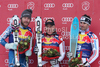 Bode Miller (USA) (L) 2nd Didier Cuche (SUI) (C) Winner and Adrien Theaux (FRA) 3rd at the presentation ceremony for the 71st Hahnenkamm downhill race part of  Audi FIS World Cup races in Kitzbuhel Austria.
