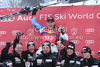 Didier Cuche (SUI) the race winner and his team at the presentation ceremony for the 71st Hahnenkamm downhill race part of  Audi FIS World Cup races in Kitzbuhel Austria.
