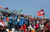 Austrian fans and some musicians at the slalom race part of  Audi FIS World Cup races in Kitzbuhel Austria.
