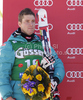 Second placed Benjamin Raich of Austria at the flower ceremony of the mens Super G race of FIS Audi Alpine World cup in Hinterstoder, Austria. mens  Super G race of FIS Audi Alpine World cup in season 2010 / 2011 was held on Saturday, 5th of February 2011 on Hannes Trinkl race track at Hinterstoder, Austria. 
