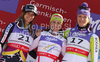 From L to R: second placed Julia Mancuso of USA, winner Elisabeth Goergl of Austria and third placed Maria Riesch of Germany at the flower ceremony of the ladies Super G race of FIS Alpine World Ski Championships in Garmisch Partenkirchen, Germany. The ladies Super G race of FIS Alpine World Ski Championships was held on Tuesday, 8th of February 2011 on course Kandahar1 at Garmisch Partenkirchen, Germany. 
