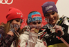 Winner Elisabeth Goergl of Austria (M), second placed Julia Mancuso of USA (L) and third placed Maria Riesch of Germany (R) at the medal ceremony of the ladies Super G race of FIS Alpine World Ski Championships in Garmisch Partenkirchen, Germany. The ladies Super G race of FIS Alpine World Ski Championships was held on Tuesday, 8th of February 2011 on course Kandahar1 at Garmisch Partenkirchen, Germany. 
