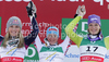 Winner Elisabeth Goergl of Austria (M), second placed Lindsey Vonn of USA (L) and third placed Maria Riesch of Germany (R) celebrate their medals won in women downhill race of FIS alpine skiing World Championships in Garmisch-Partenkirchen, Germany. Women downhill race of FIS alpine skiing World Championships, was held on Sunday, 13th of February 2011, in Garmisch-Partenkirchen, Germany.
