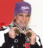 Third placed Maria Riesch of Germany celebrates her medal won in Women downhill race of FIS alpine skiing World Championships in Garmisch-Partenkirchen, Germany. Women downhill race of FIS alpine skiing World Championships, was held on Sunday, 13th of February 2011, in Garmisch-Partenkirchen, Germany.

