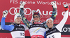 Winner Aksel Lund Svindal of Norway (M), second placed Christof Innerhofer of Italy (L) and third placed Peter Fill of Italy (R) celebrate their medals won in men super combined race of FIS alpine skiing World Championships in Garmisch-Partenkirchen, Germany. Men super combined race of FIS alpine skiing World Championships, was held on Monday, 14th of February 2011, in Garmisch-Partenkirchen, Germany.
