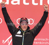 Winner Aksel Lund Svindal of Norway celebrates his medal won in men super combined race of FIS alpine skiing World Championships in Garmisch-Partenkirchen, Germany. Men super combined race of FIS alpine skiing World Championships, was held on Monday, 14th of February 2011, in Garmisch-Partenkirchen, Germany.
