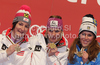 Winner Marlies Schild of Austria (M), second placed Kathrin Zettel of Austria (L) and third placed Maria Pietilae-Holmner of Sweden (R) celebrate their medals won in Women slalom race of FIS alpine skiing World Championships in Garmisch-Partenkirchen, Germany. Women slalom race of FIS alpine skiing World Championships, was held on Saturday, 19th of February 2011, in Garmisch-Partenkirchen, Germany.
