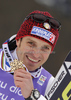 Third placed Manfred Moelgg of Italy celebrates his medal won in Men slalom race of FIS alpine skiing World Championships in Garmisch-Partenkirchen, Germany. Men slalom race of FIS alpine skiing World Championships, was held on Sunday, 20th of February 2011, in Garmisch-Partenkirchen, Germany.
