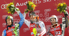 Winner Mario Matt of Austria (M), and second placed Axel Baeck of Sweden (L) and Nolan Kasper of USA (R) celebrate their medals won in Men slalom race of Audi FIS alpine skiing World Cup 2010-2011 in Kranjska Gora, Slovenia. Men slalom race of FIS alpine skiing World Championships, was held on Sunday, 6th of March 2011, in Kranjska Gora, Slovenia.
