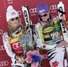 Lindsey Vonn of USA (R) Maria Riesch of Germany (L) celebrates her medal won in Women super-g race of Audi FIS alpine skiing World Cup 2010-2011 in Tarvisio, Italy. Women super-g race of Audi FIS alpine skiing World Cup 2010-2011, was held on Sunday, 6th of March 2011, in Tarvisio, Italy.
