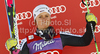 Second placed Viktoria Rebensburg of Germany celebrates her medal won in women giant slalom race of Audi FIS Alpine skiing World cup in Soelden, Austria. First race of season 2011-2012 was held on Rettenbach glacier above Soelden, Austria, on Saturday, 22nd of October 2011.

